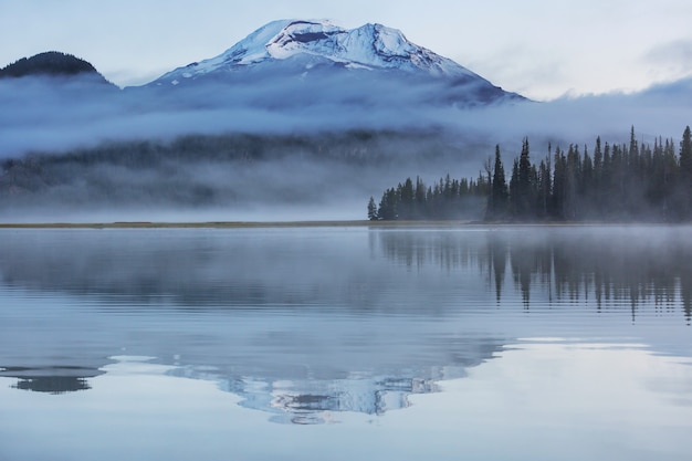 Serene beautiful lake in morning mountains, Oregon, USA.