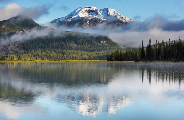 Serene beautiful lake in morning mountains, Oregon, USA.