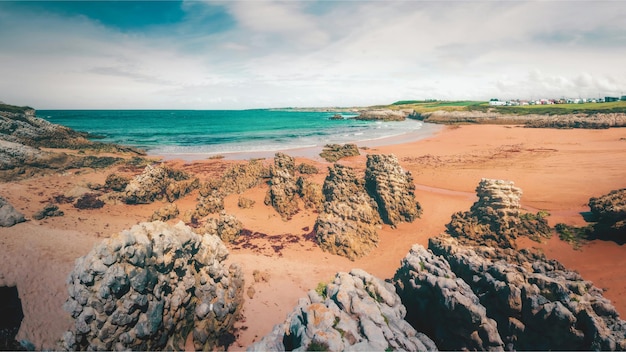 Photo serene coastal landscape 4k wallpaper tranquil beach and rocky shores