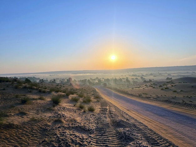 Serene Desert Road at Sunset