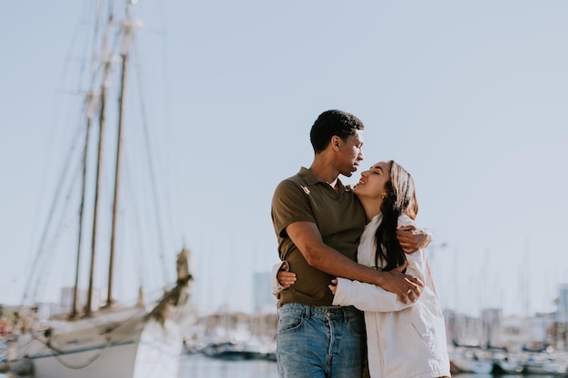 Serene stroll along Barcelona marina at with vintage sailing vessel