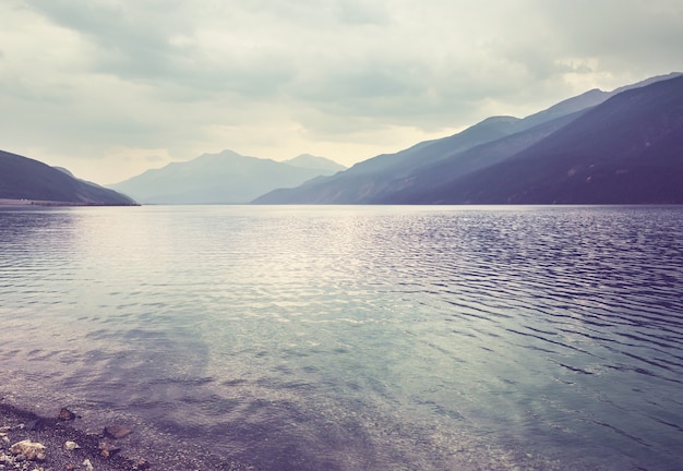 Serenity lake in the mountains in summer season. Beautiful natural landscapes.