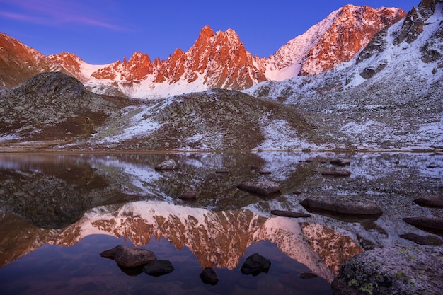 Serenity lake in the mountains in summer season. Beautiful natural landscapes.