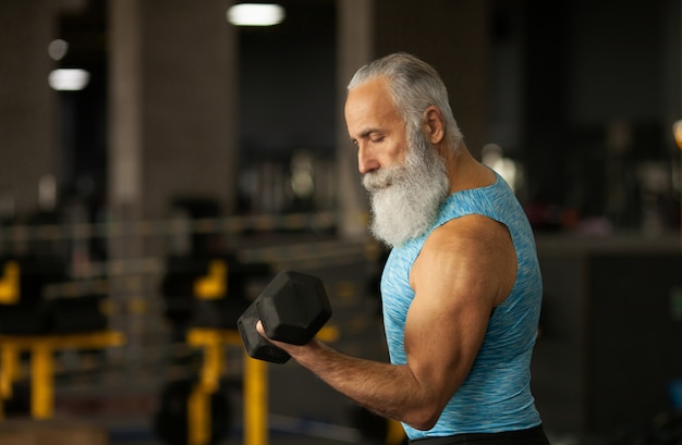 Serious bearded senior male is enjoying sporty lifestyle