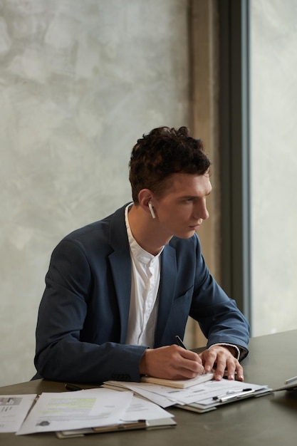 Serious Businessman Watching Product Presentation