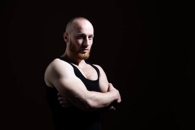 Serious concentrated male model. Handsome confident man. Serious guy posing in studio.