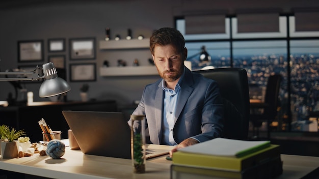 Serious director checking phone notification night room closeup smiling man