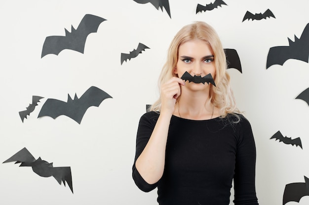 Serious woman ready for Halloween party