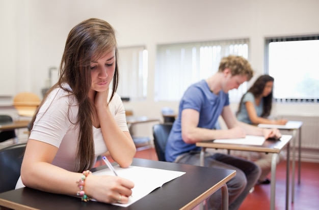 Serious young adults studying