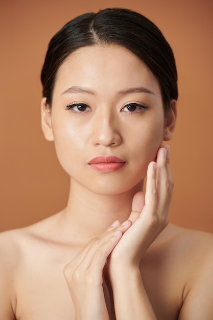 Serious Young Woman with Natual Makeup