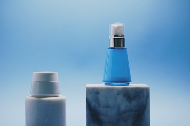 Serum bottle and facial cream jar on blue background luxury skincare products beauty and cosmetics