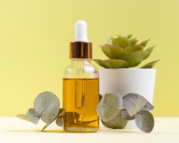 Serum bottle with potted plant