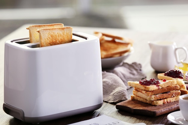 Photo served table for breakfast with toast and coffee on blurred background