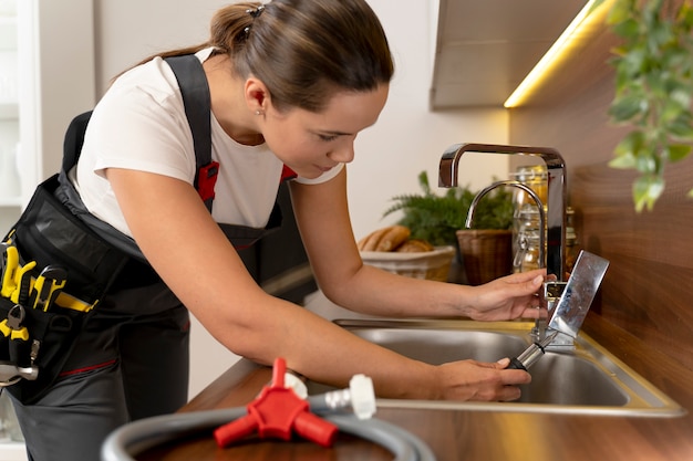 Service maintenance worker repairing