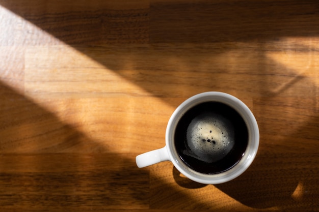 Serving coffee on a white cup