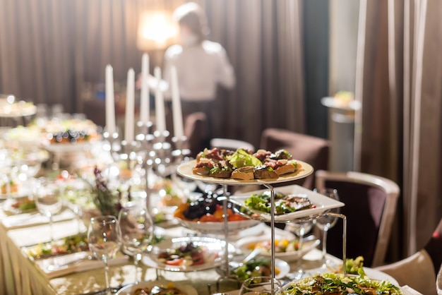 Serving dishes in the restaurant. luxury dinner served on the table