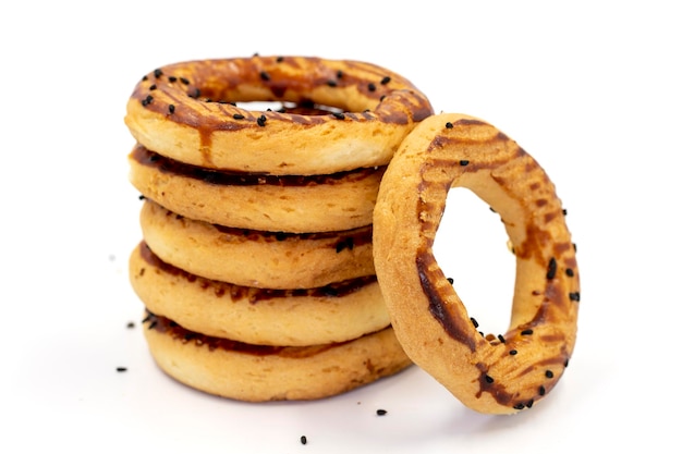 Sesame bagel isolated on white background Traditional Turkish cuisine delicacies local name kandil simidi