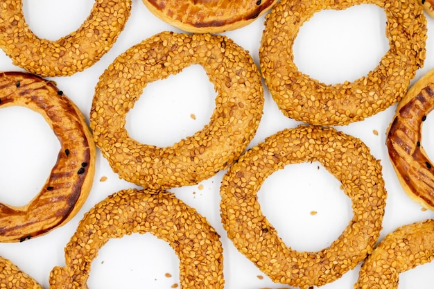 Sesame bagel isolated on white background Traditional Turkish cuisine delicacies local name kandil simidi