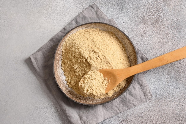 Sesame flour in bowl for cooking vegan glutenfree dessert