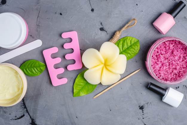 Set of accessories and tools for Spa pedicure and manicure on the grey background