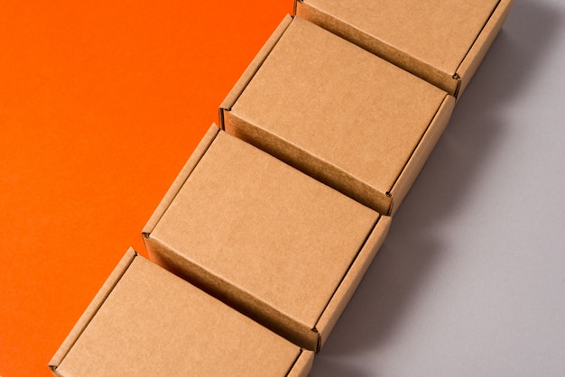 Set of brown cardboard boxes on colorful background