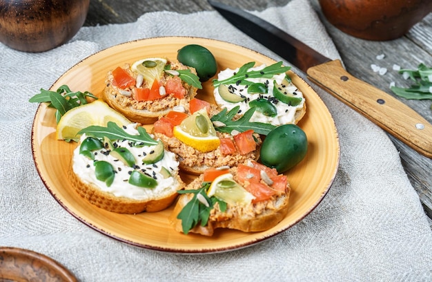 Set of bruschetta with various toppings Variety of open sandwiches Assorted small sandwiches