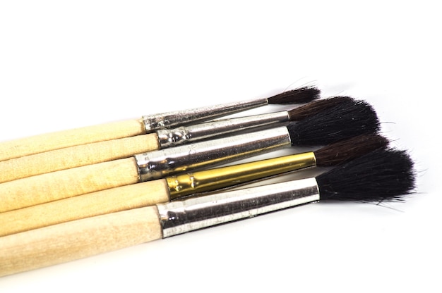 Set of brushes close up on white