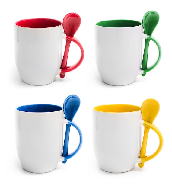 Set of colored cups with spoon isolated