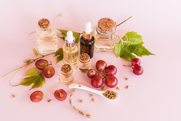 A set of cosmetics in various glass bottles based on organic grape seed oil the fountain of youth natural cosmetics