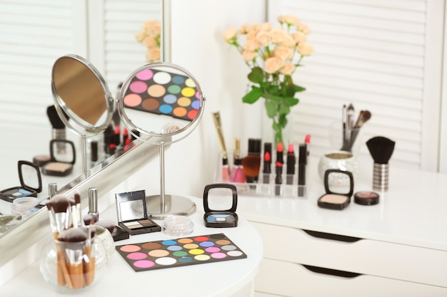 Set of decorative cosmetics on table