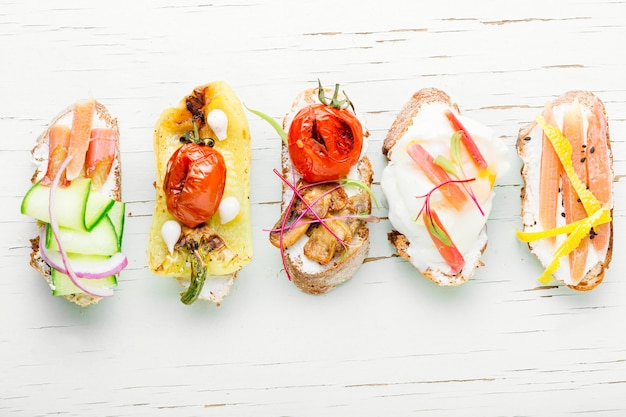 Set of delicious Italian bruschettas with grilled vegetables.Bruschetta or canape