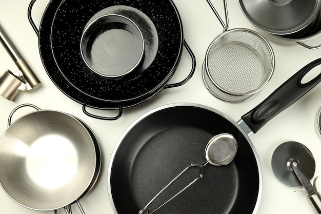 Set of different kitchen utensil on white background.