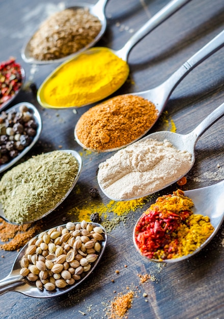 Set of different spices and spices in spoons