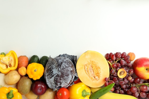 Set of different vegetables and fruits on white background