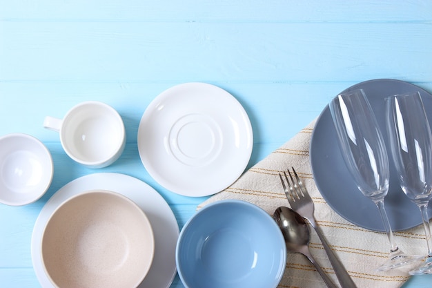 Set of dishes and kitchen utensils top view