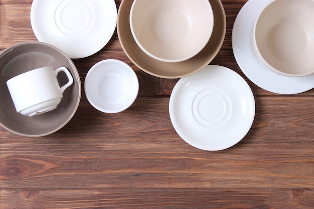 Set of dishes and kitchen utensils top view