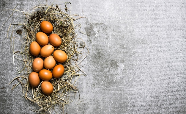 A set of eggs in the hay