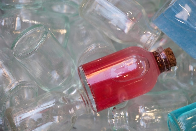 Set of Empty little transparent bottles in a box