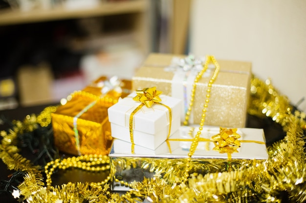 Set of festive multicolored Christmas gifts on the table