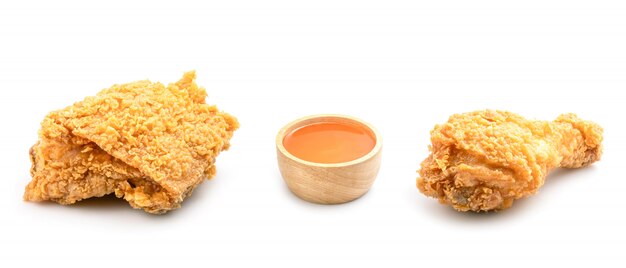 Set of fried chicken and chilli sauce on white