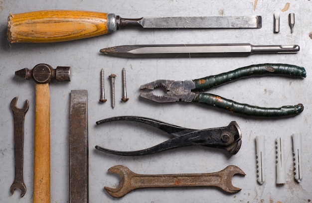 Set of hand old tools on grey background