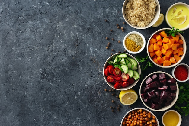 Set of healthy vegetarian ingredients for cooking. Spiced chickpeas, Baked pumpkin and beets, quinoa and vegetables.