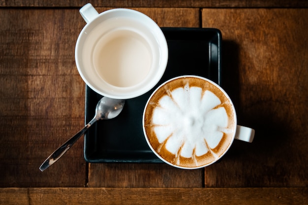 Set of hot espresso coffee include tea and sugar on table background