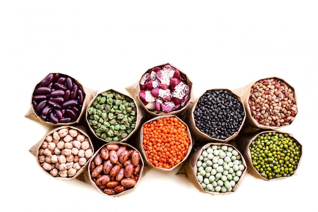 Set of indian seeds in paper sacks isolated on white background