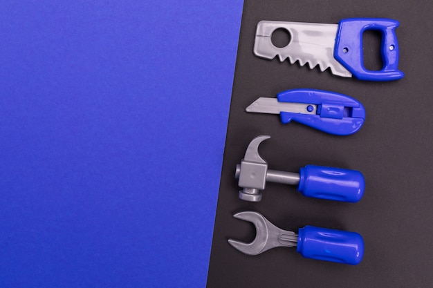 Set of joiner's tools on colorful background