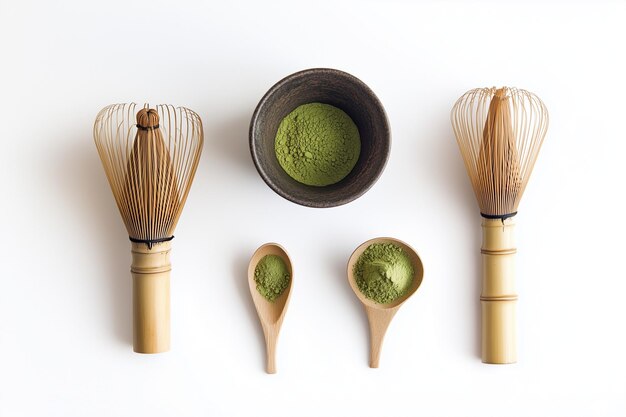 Photo a set of kitchen utensils with a black container with green liquid in it