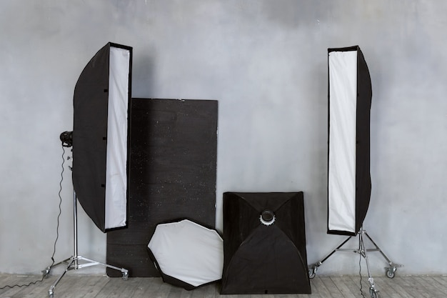 A set of lighting equipment. Pulsed light in the studio.