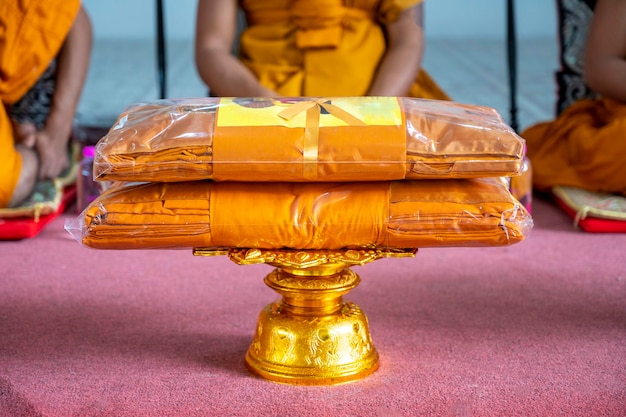 Set of monk's robes placed on the pedestal