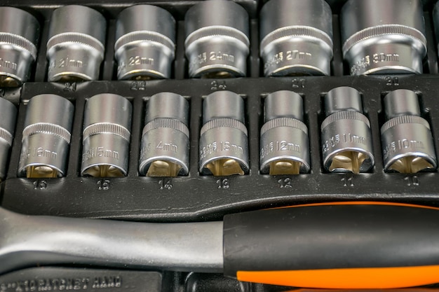 A set of new heads with ratchet wrenches for car repairs