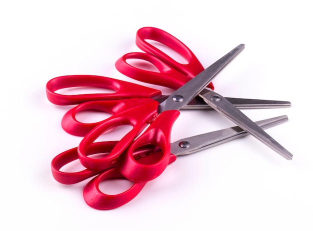 Set of new red paper scissors on a white background